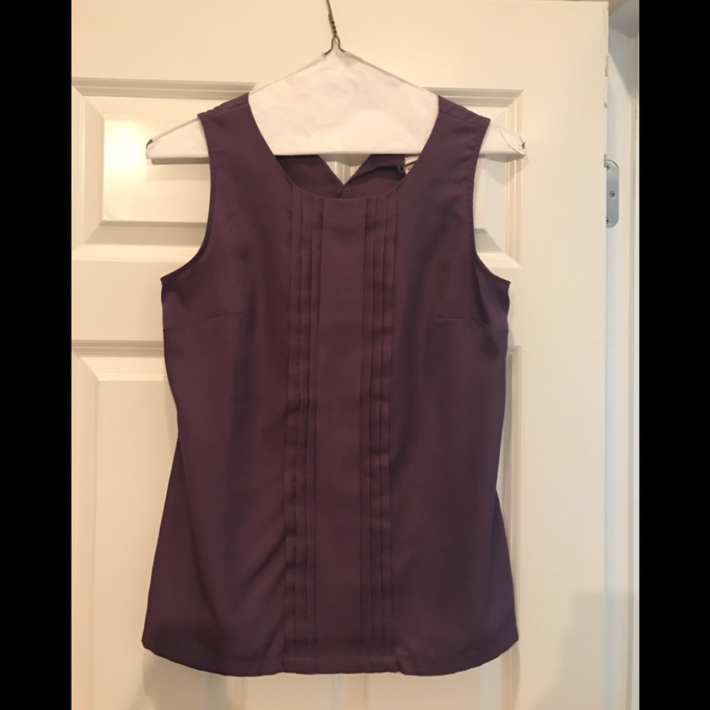 Purple pleated sleeveless blouse. Worn once.